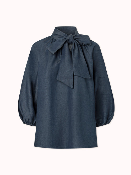 BLUSA MANGA ABULLONADA CON LAZO EN CUELLO EN DENIM
