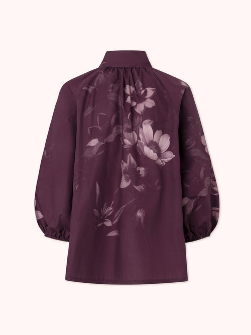 BLUSA MANGA ABULLONADA CON ESTAMPADO FLORAL MORADO