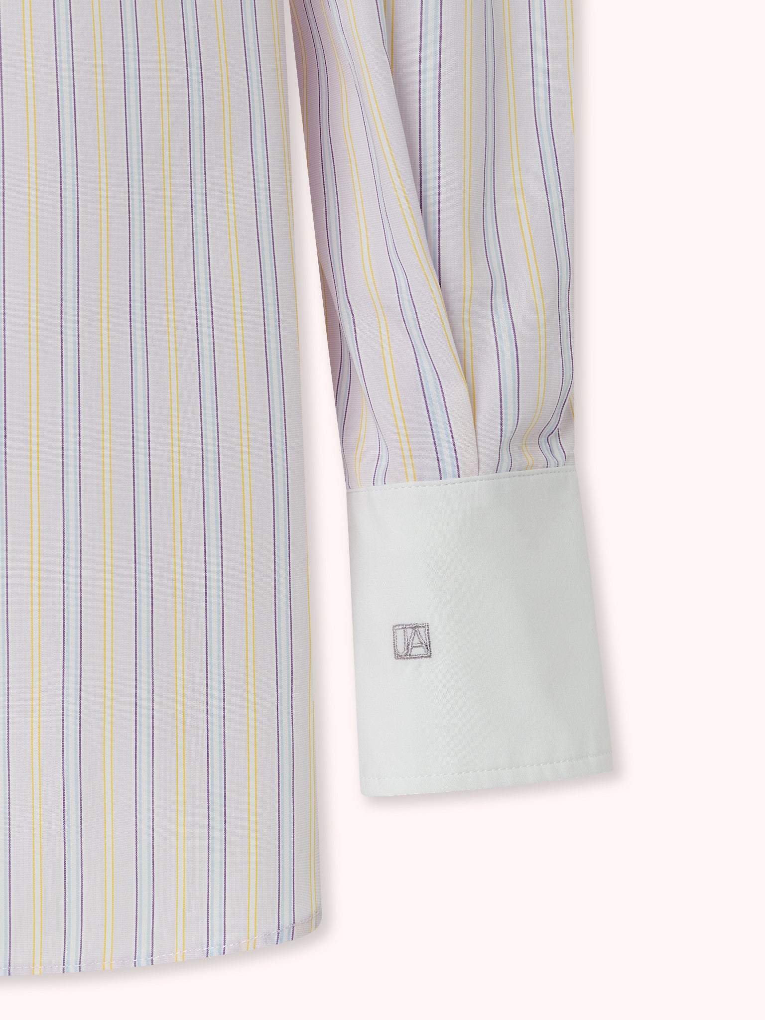 CAMISA CON PUÑO BLANCO Y ESTAMPADO DE RAYAS AZUL