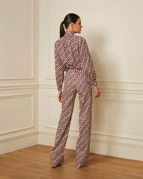 BLUSA MANGA ABULLONADA CON ESTAMPADO BURDEOS