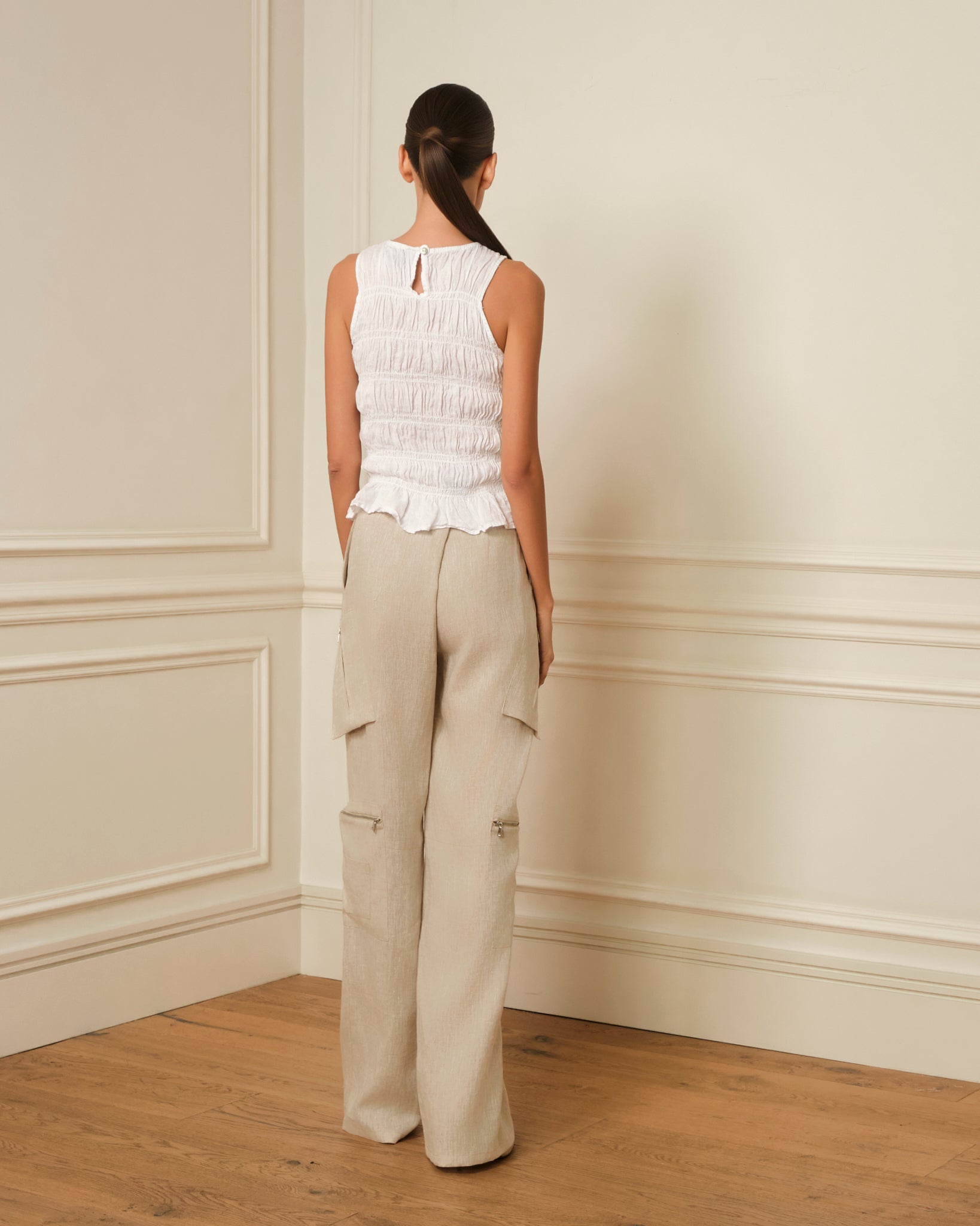 TOP FRUNCIDO SIN MANGAS BLANCO