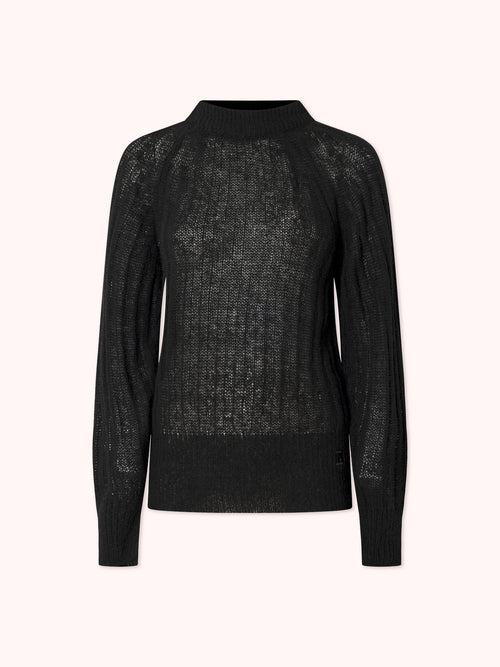 SUÉTER DE PUNTO CANALÉ CON CUELLO REDONDO NEGRO