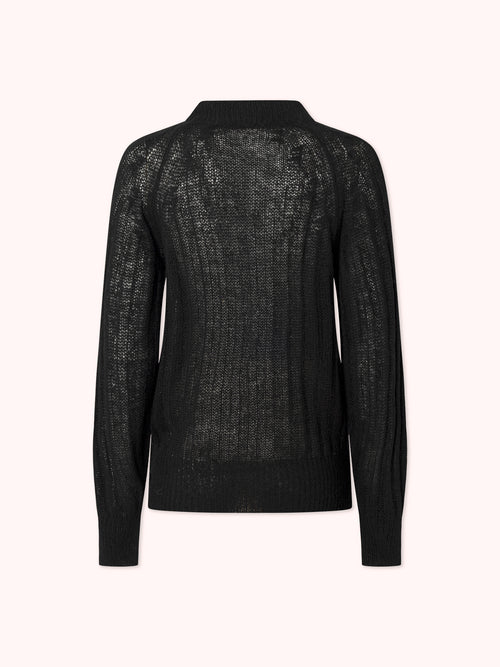 SUÉTER DE PUNTO CANALÉ CON CUELLO REDONDO NEGRO