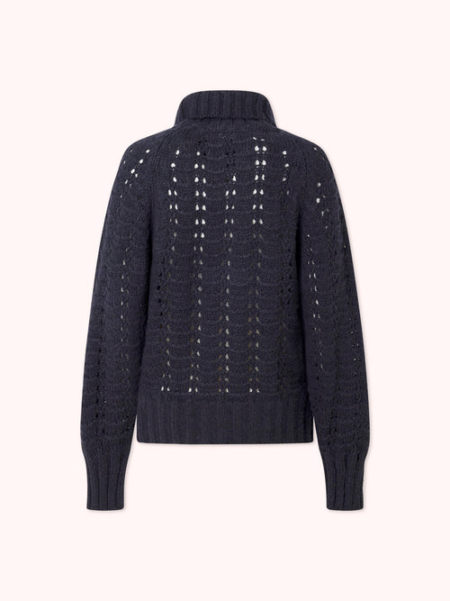 SUÉTER DE PUNTO CALADO CON CUELLO CISNE AZUL MARINO