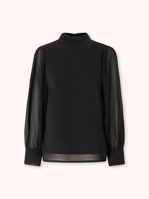 BLUSA DE CUELLO ALTO CON LAZADA NEGRA