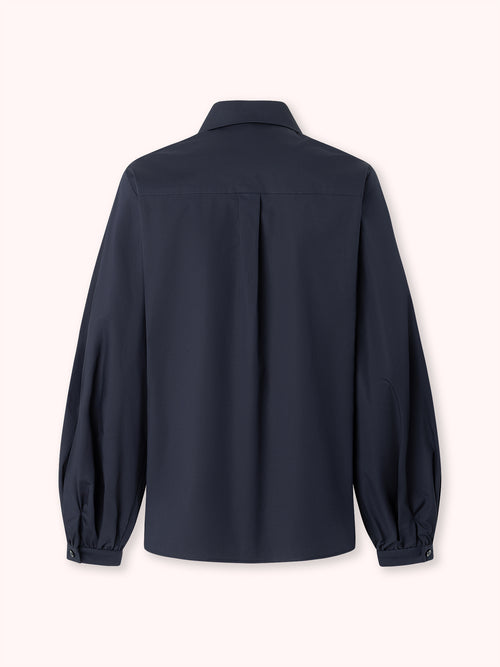 CAMISA DE MANGA ABULLONADA AZUL