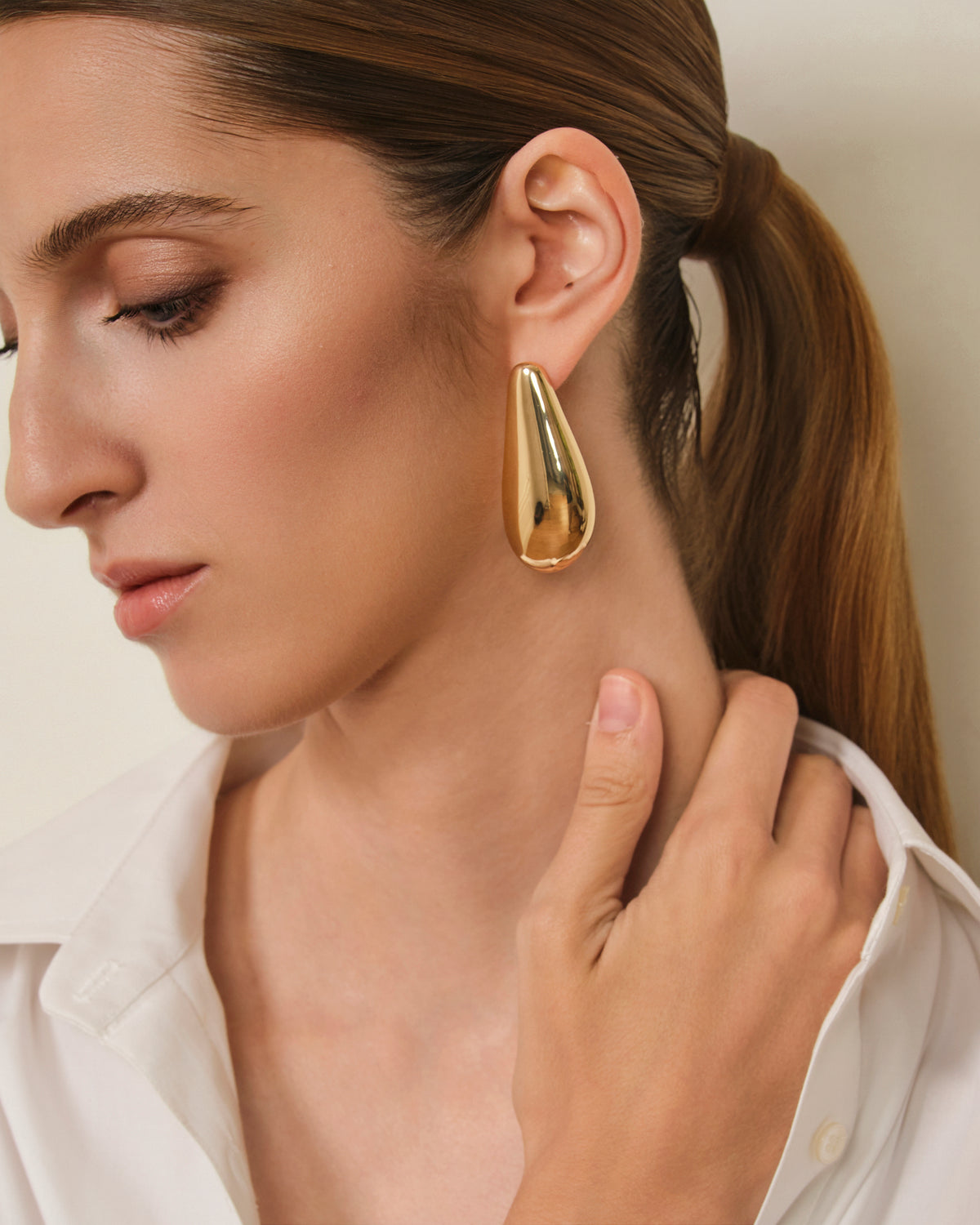 PENDIENTES OVALADOS METÁLICOS DORADO