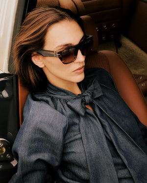 BLUSA MANGA ABULLONADA CON LAZO EN CUELLO DENIM AZUL MARINO