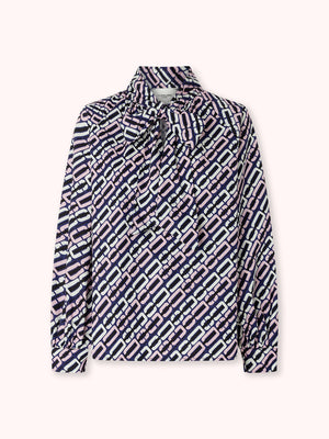 BLUSA MANGA ABULLONADA CON ESTAMPADO