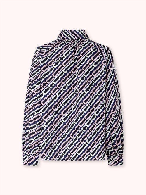 BLUSA MANGA ABULLONADA CON ESTAMPADO