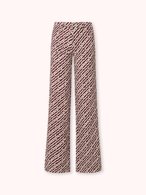 PANTALÓN FLARE CON BOLSILLOS ESTAMPADO BURDEOS