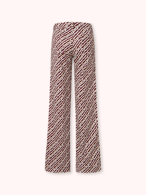 PANTALÓN FLARE CON BOLSILLOS ESTAMPADO BURDEOS