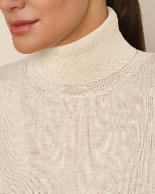 JERSEY SIN MANGAS CUELLO ALTO CRUDO