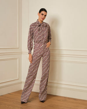 PANTALÓN FLARE CON BOLSILLOS ESTAMPADO BURDEOS